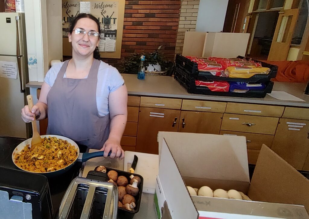 LIFTT team member Jocelyn Vincent cooking breakfast