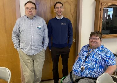LIFTT Team Member Jed Barton with Josiah Porcel of Sen. Jon Tester's staff and Mitch Bohn of the Wide Left Sports Podcast at the LIFTT Grand Opening May 10, 2024