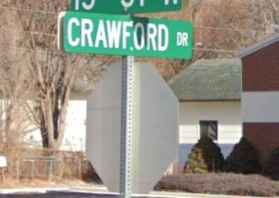 Street sign at the corner of 13th Avenue W and Crawford Drive in Billings. Starting in April LIFTT will move into a new buiding on NE part of the corner.